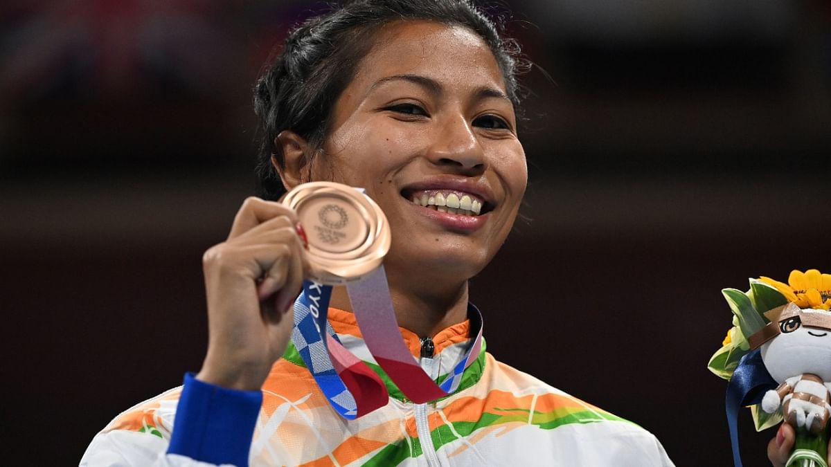 Indian boxer Lovlina Borgohain upped India's medal tally as she took the bronze medal at the Tokyo Olympics. She lost the women's welterweight (64-69kg) semi-final bout to Turkey's Busenaz Surmeneli. Credit: AFP Photo