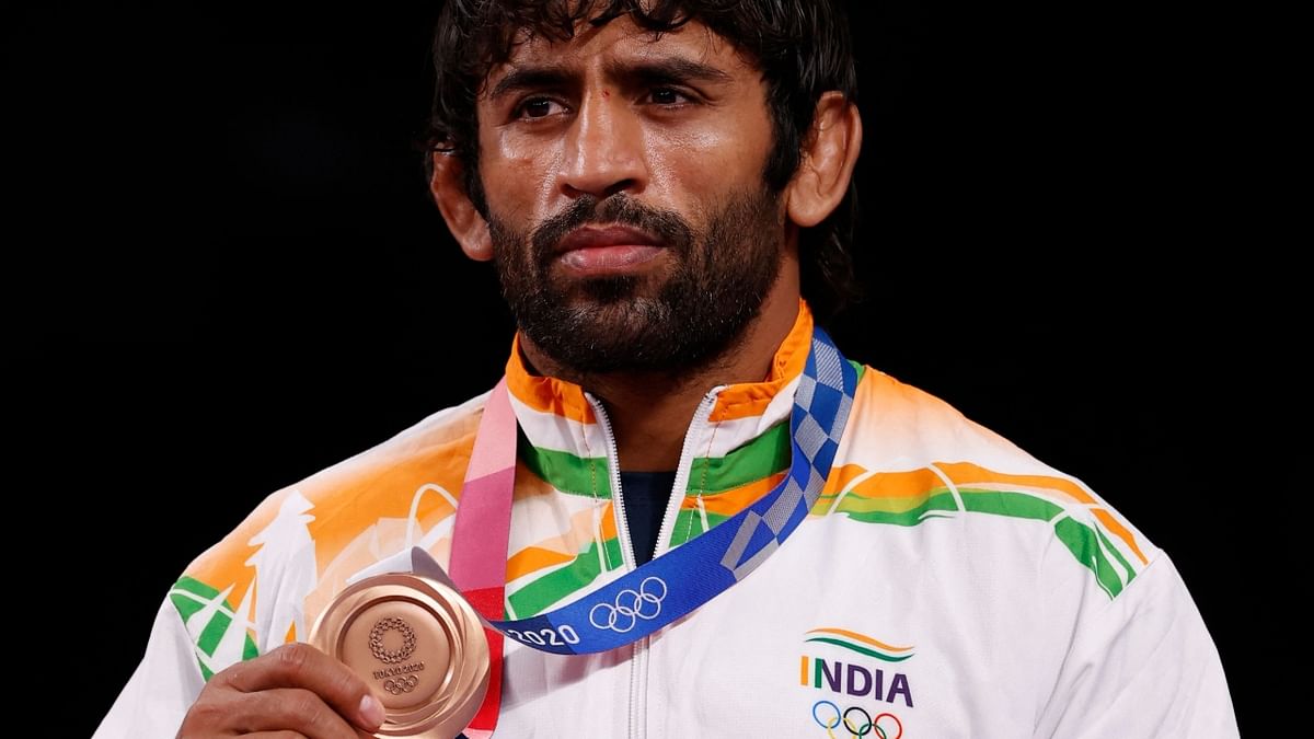 Wrestler Bajrang Punia won a bronze medal in the men's freestyle 65kg category at the Tokyo Olympics. He defeated Kazakhstan's Daulet Niyazbekov 8-0 in the bronze medal match. Credit: AFP Photo