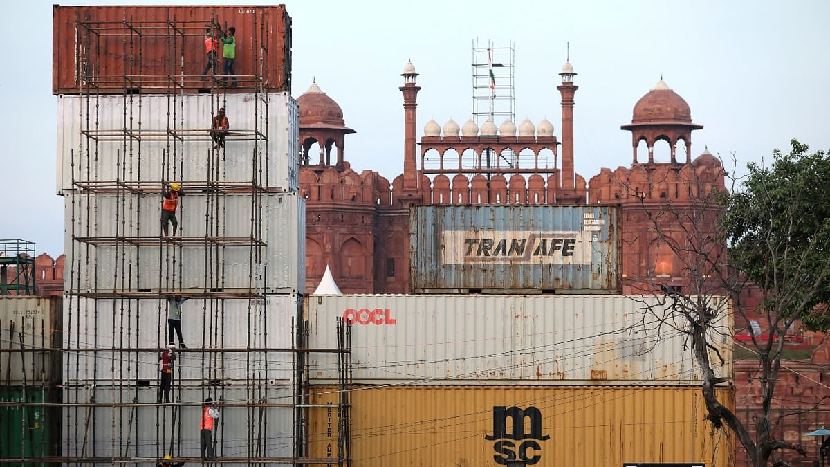 As the nation gears up for Independence Day, security has been beefed up at Red Fort and other prominent areas. In a first, Delhi Police has barricaded Red Fort with shipment containers for security purposes. Credit: Reuters Photo