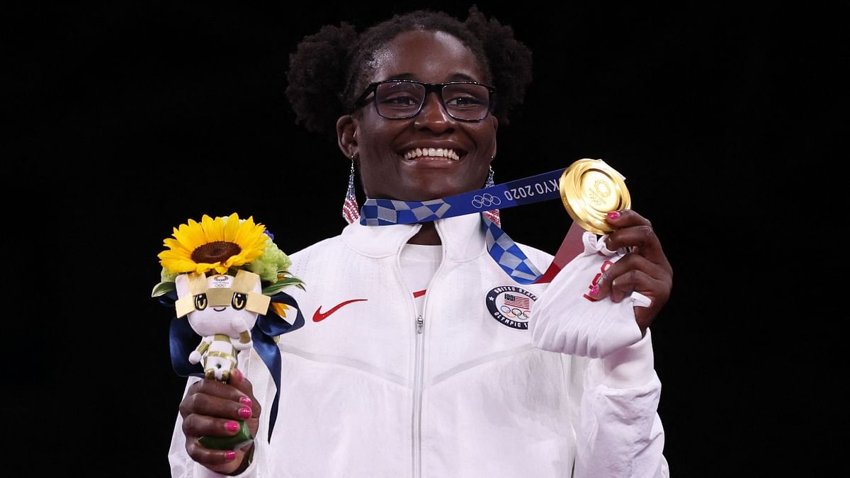 Gold medalist USA's Tamyra Marianna Stock Mensah poses with her medal after the women's freestyle 68kg wrestling competition. Credit: AFP Photo