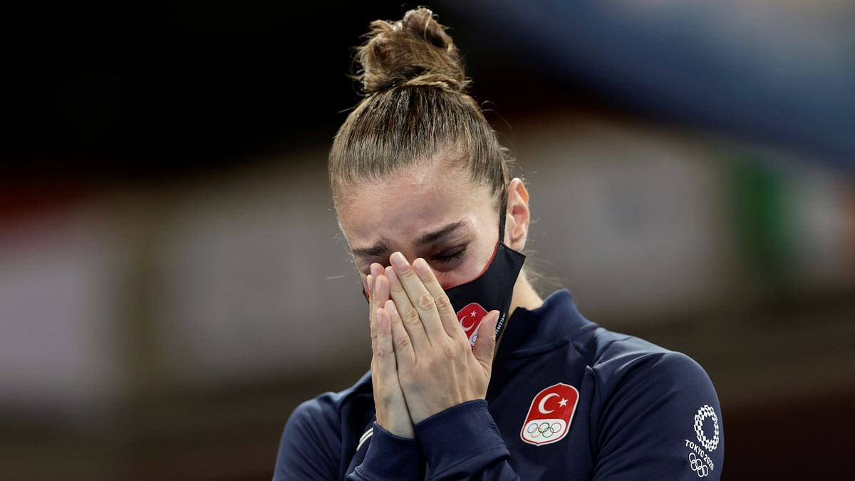 Silver medallist Turkey's Buse Naz Cakiroglu celebrates on the podium during the medal ceremony for the women's fly (48-51kg) boxing final bout during the Tokyo 2020 Olympic Games. Credit: Reuters Photo