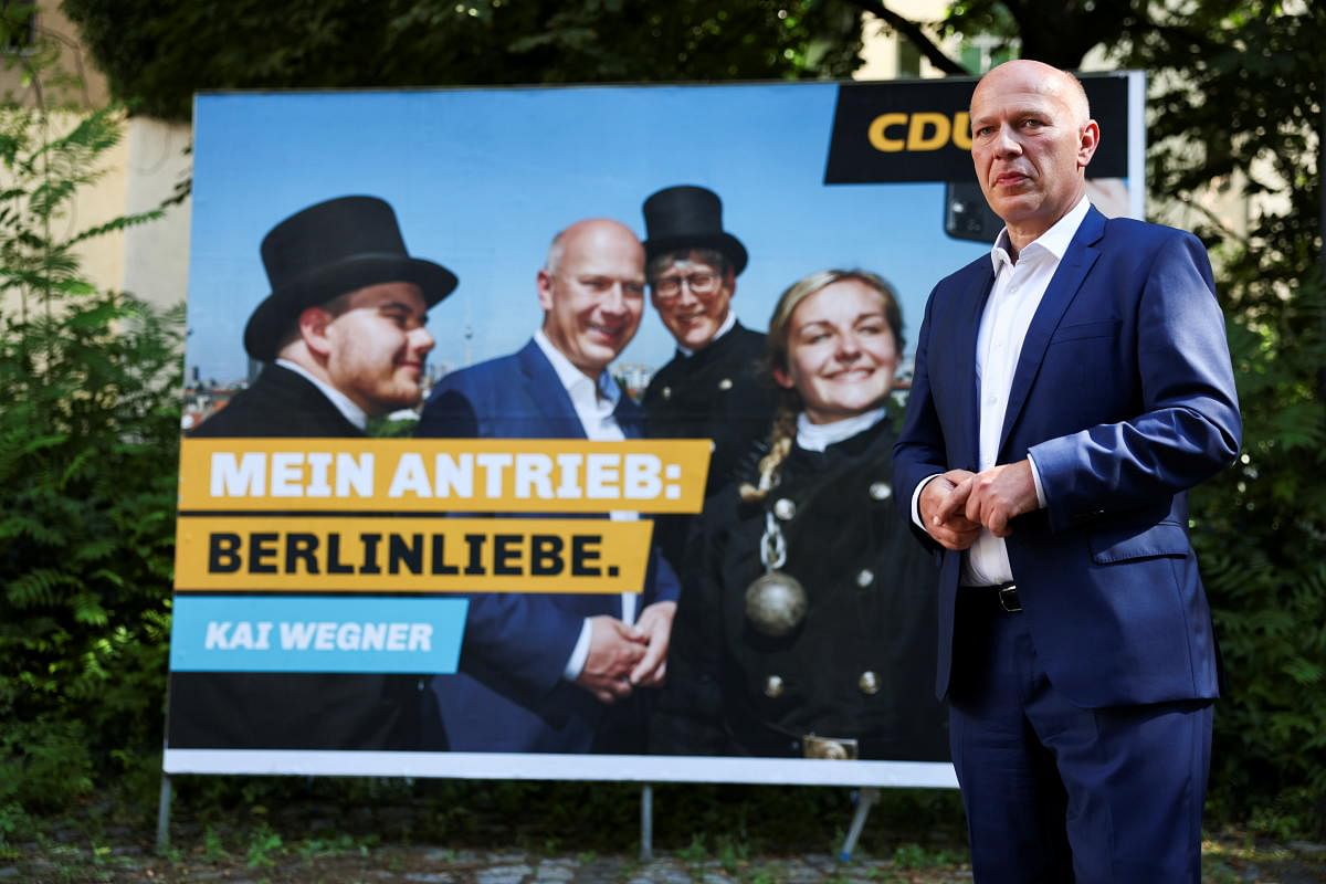 Kai Wegner, top candidate of the CDU for the election to the Berlin House of Representatives, presents the new election posters, in Berlin. Credit: Reuters Photo