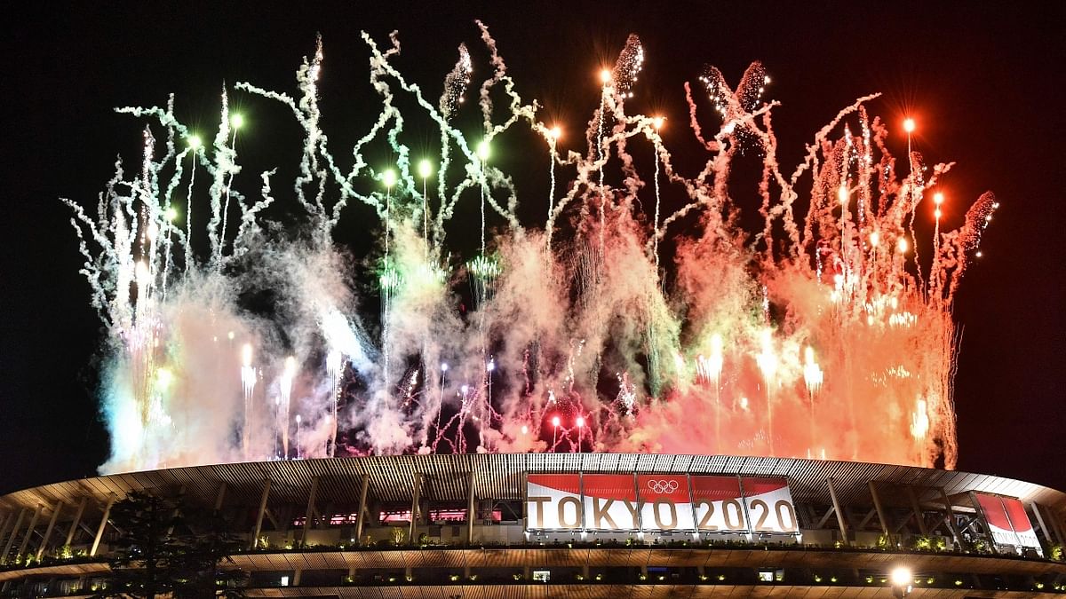 Fireworks go off around the Olympic Stadium during the closing ceremony of the Tokyo 2020 Olympic Games. Credit: AFP Photo