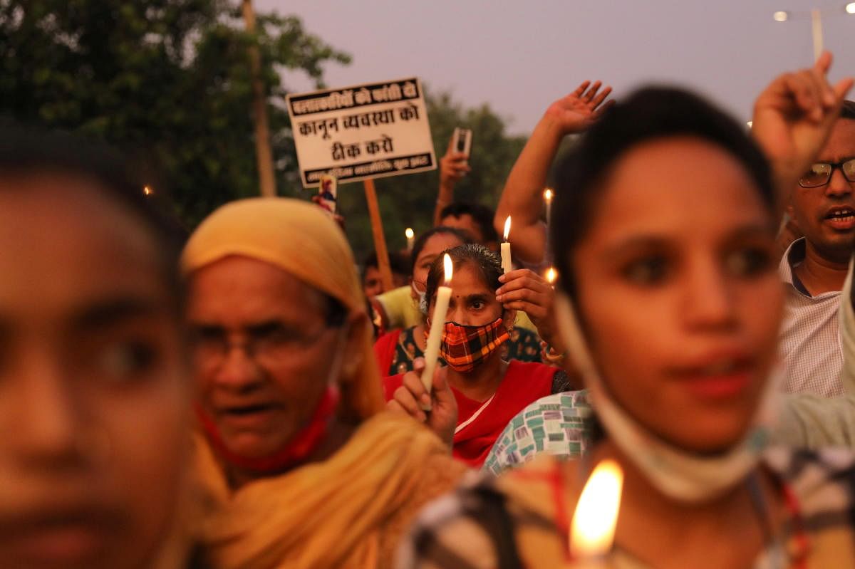 People attend a candlelight vigil to protest against the alleged rape and murder of a 9-year-old girl in New Delhi. Credit: Reuters Photo