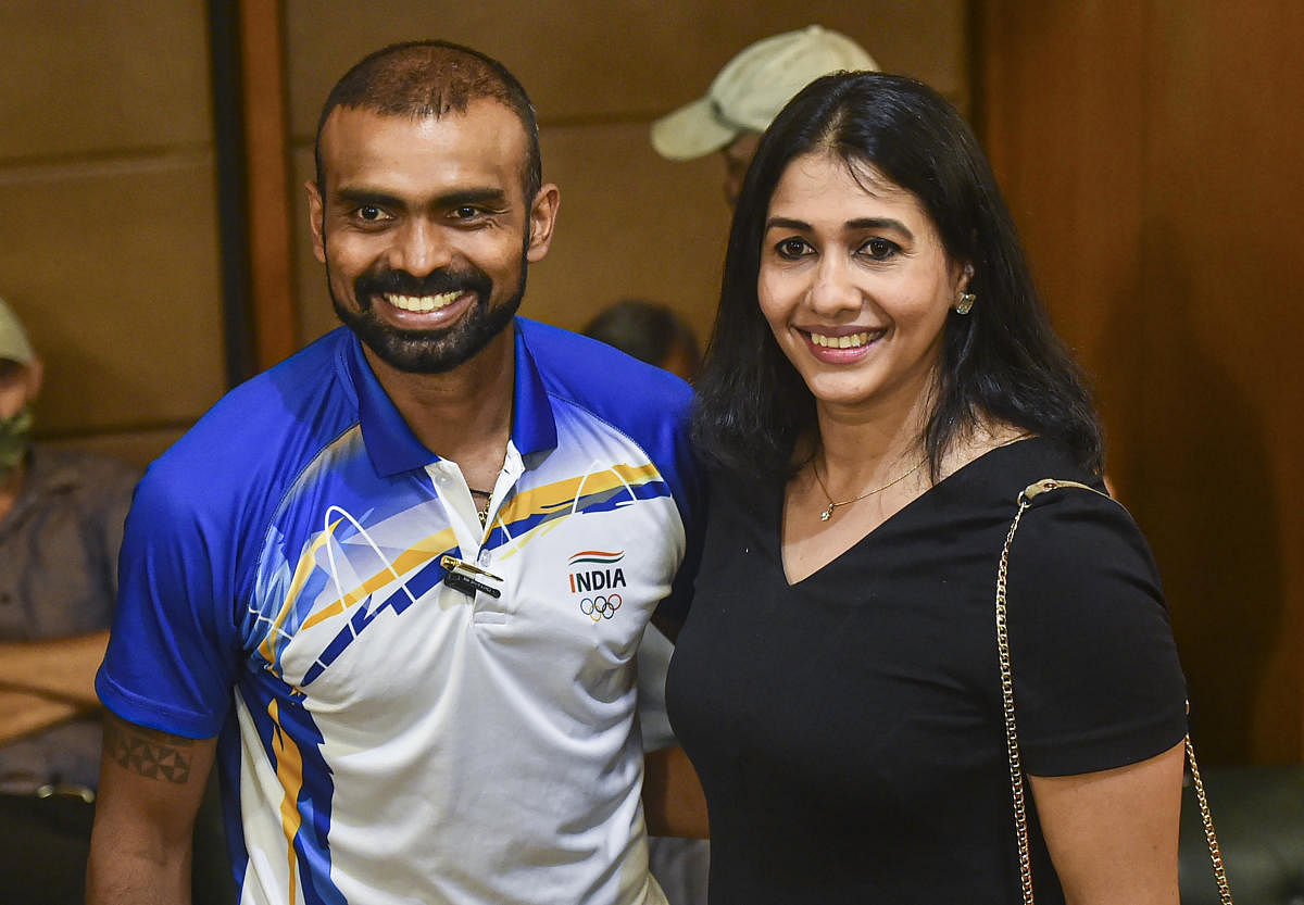 Bronze medalist in Tokyo Olympics, hockey player PR Sreejesh with retired athlete Anju Bobby George during his felicitation ceremony. Credit: PTI Photo