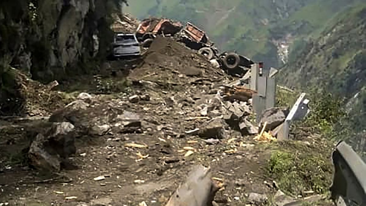 A massive landslide at Kinnaur in Himachal Pradesh has claimed the lives of two people and over 40 people feared trapped under the debris. Credit: PTI Photo