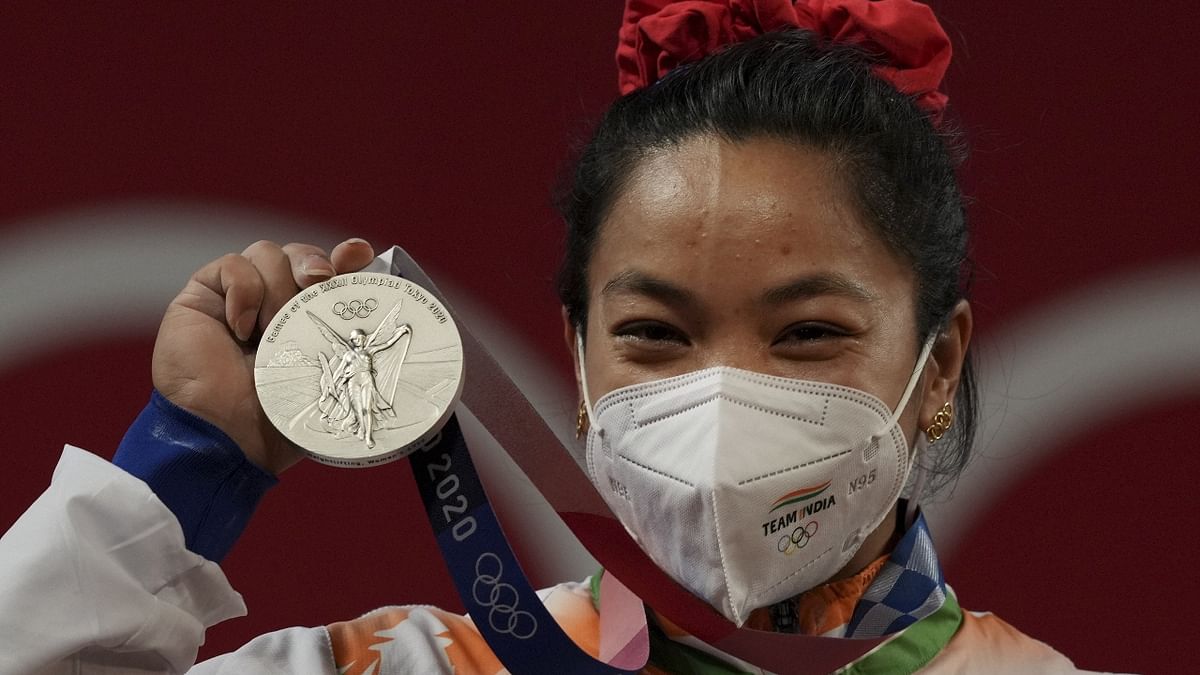 Dominos has promised to give free pizza for life to wrestler Mirabai Chanu, who gave India a silver on day one at the Tokyo Olympics. Credit: PTI Photo
