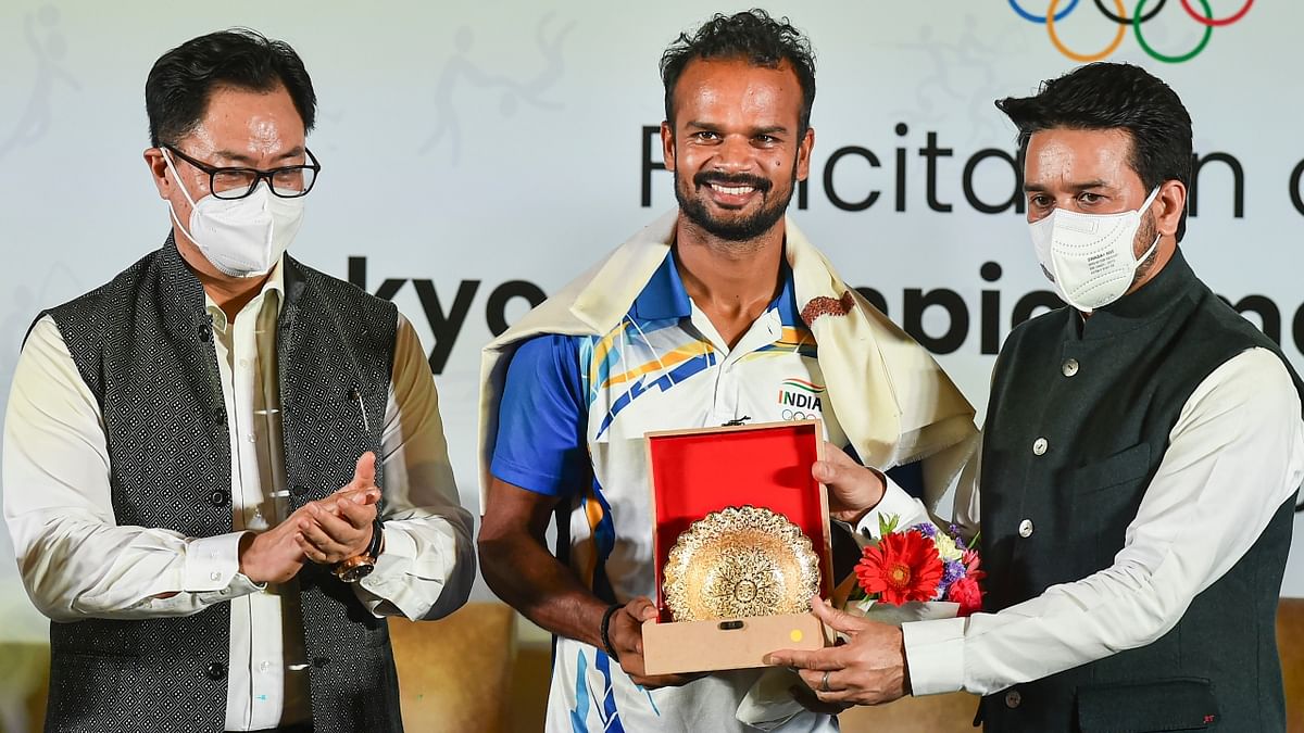 At the felicitation ceremony, athletes were presented mementos and shawls by the minister. Credit PTI Photo