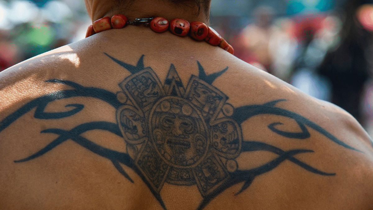 View of an indigenous man's tattoo during the celebration of the 500 anniversary of the last day of domain ahead of the fall of Tenochtitlan to the Spanish at the Zocalo square in Mexico City. Credit: AFP Photo