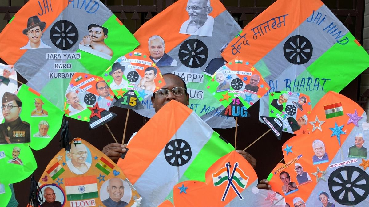 A kite maker displays kites with images of Indian leaders and freedom fighters ahead of Independence celebrations, in Amritsar. Credit: PTI Photo