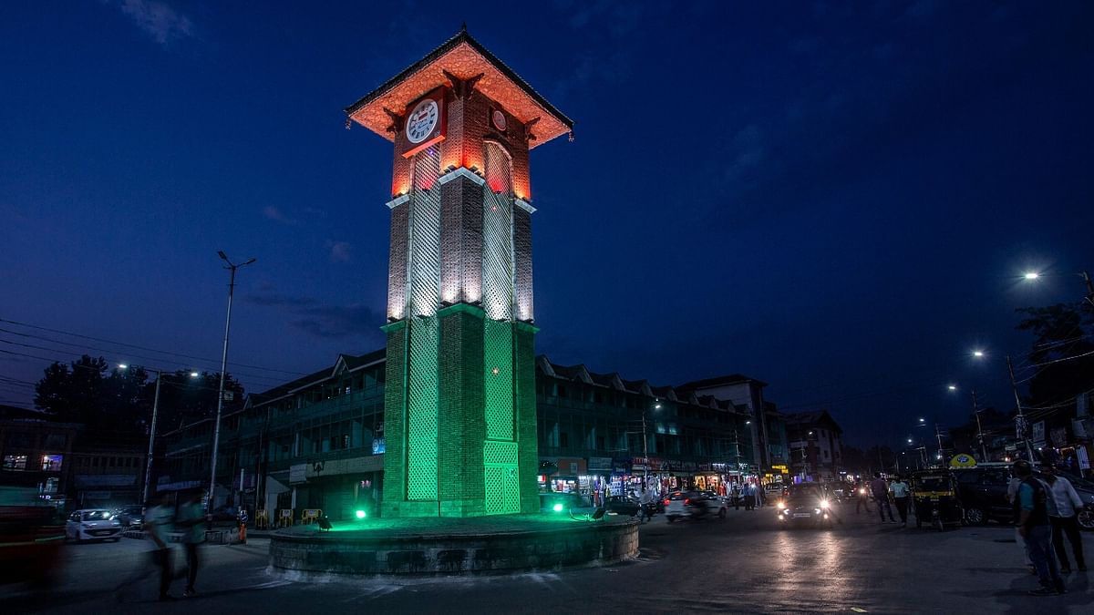 The Clock Tower (Ghanta Ghar) is seen illuminated for the first time in Indian tricolour at Lal Chowk in Srinagar. Credit: AFP Photo