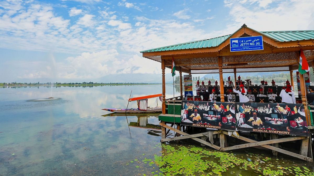 Army band performs as part of celebrations to mark the 75th Independence Day, at the banks of Dal Lake in Srinagar. Credit: PTI Photo