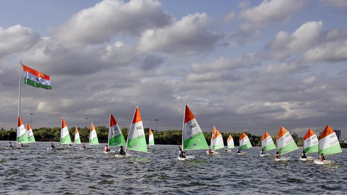 The Yacht Club of Hyderabad celebrates 75 years of India’s Independence at Hussain Sagar Lake in Hyderabad. Credit: PTI Photo