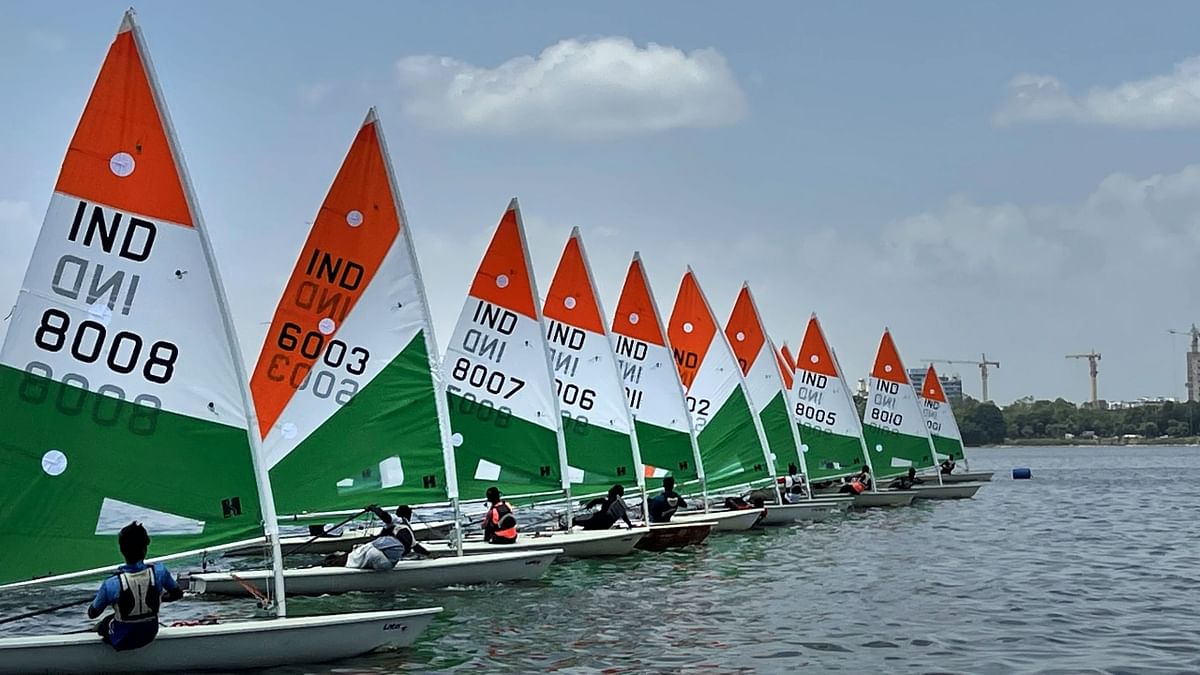 The Yacht Club of Hyderabad celebrates 74 years of India’s independence at Hussain Sagar Lake in Hyderabad. Credit: PTI Photo