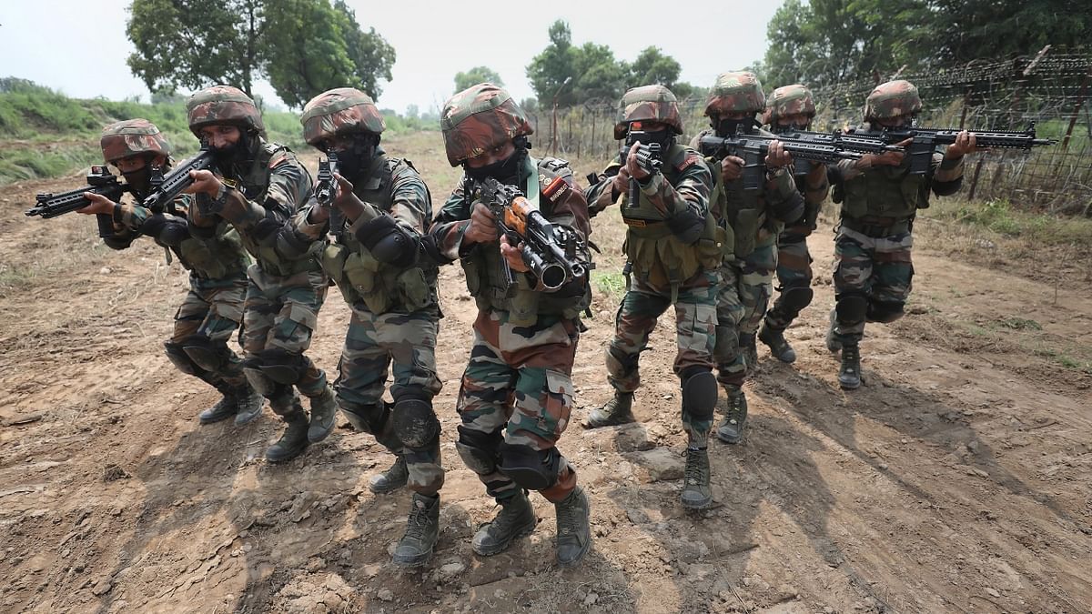 Army personnel keep vigil on Line of Control (LoC), ahead of the 75th Independence Day celebration, at Pallanwala Sector in Akhnoor, Jammu and Kashmir. Credit: PTI Photo