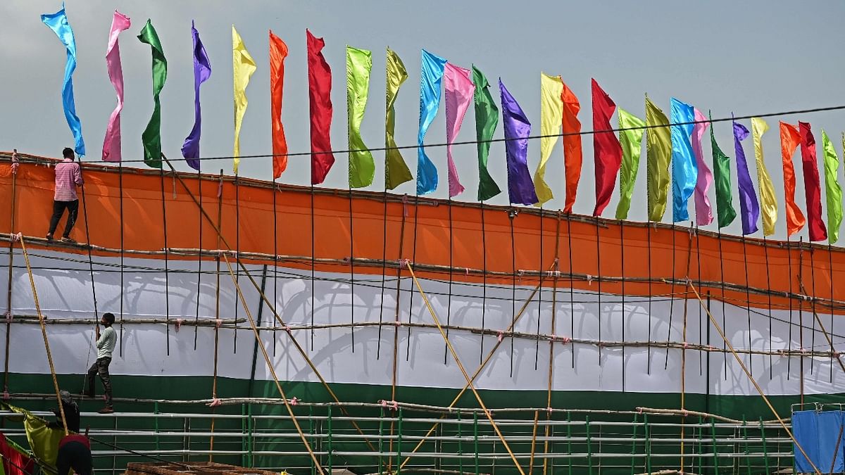 Labourers work during the preparations at the Red Fort ahead of the India's Independence Day celebrations in New Delhi. Credit: AFP Photo