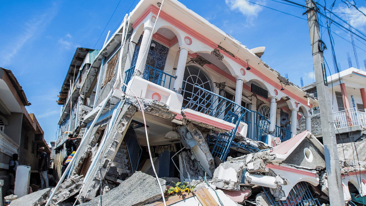 A view shows houses destroyed following a 7.2 magnitude earthquake in Les Cayes, Haiti. Credit: Reuters Photo
