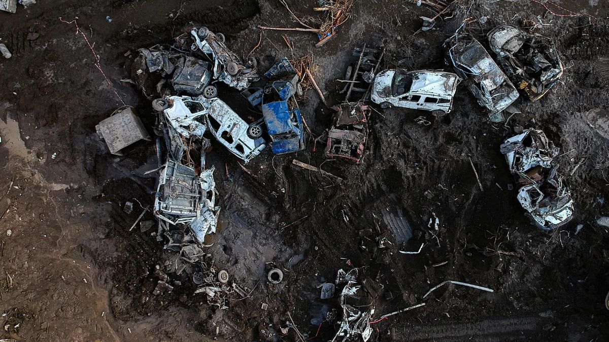 An aerial view of cars destroyed in debris after the Ezine river broke its banks during flash floods in Bozkurt in the district of Kastamonu, in the Black Sea region of Turkey. Credit: AFP Photo