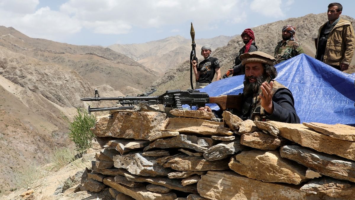 Armed men who are against Taliban uprising stand at their check post, at the Ghorband District, Parwan Province, Afghanistan. Credit: Reuters Photo