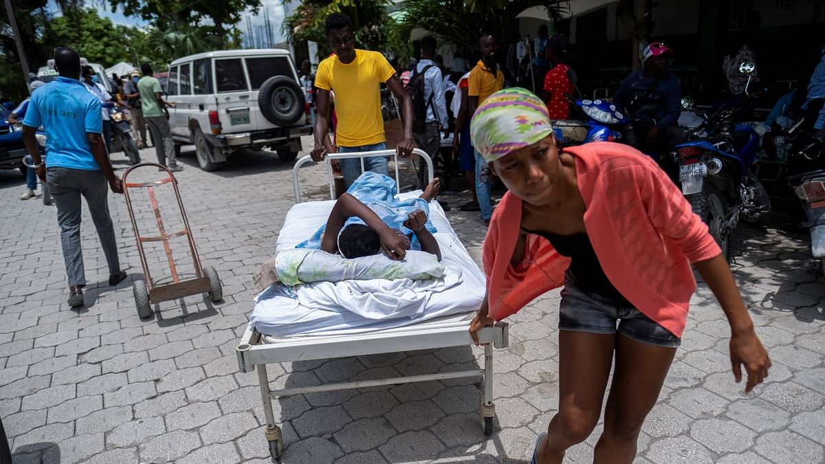 At least 1,297 people were killed in the 7.2-magnitude quake that struck about 100 miles (160 kilometers) to the west of the densely populated capital Port-au-Prince. Credit: Reuters Photo