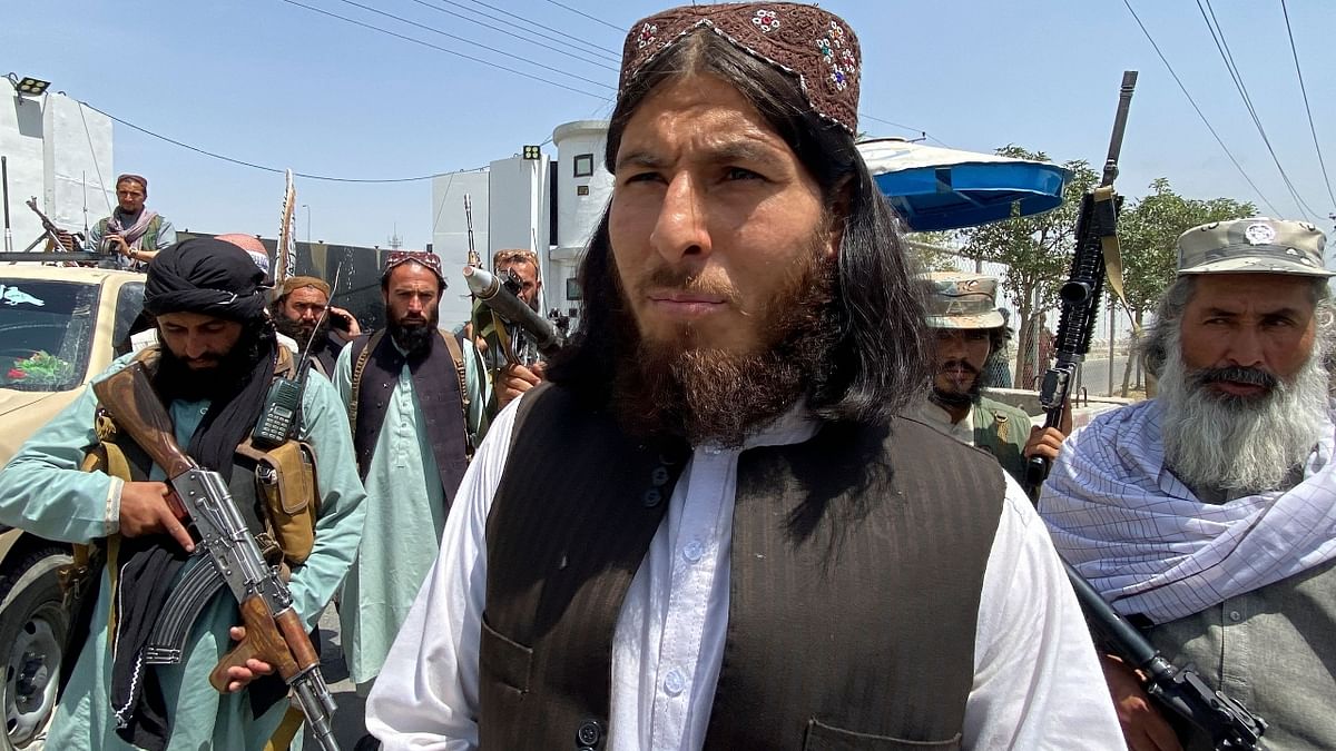 Men are not allowed to shave their beards as Taliban says it is against Islam. Credit: AFP Photo