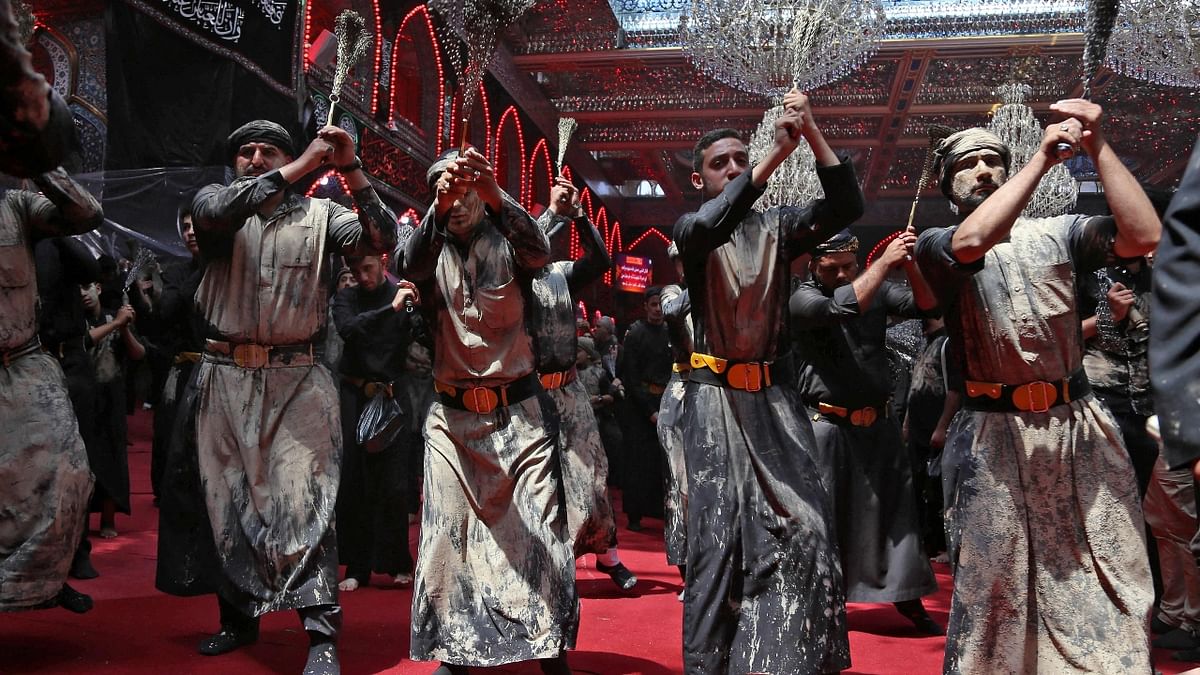 Muslims take part in a mourning procession at the Imam Abbas shrine in Iraq's holy city of Karbala. Credit: AFP Photo