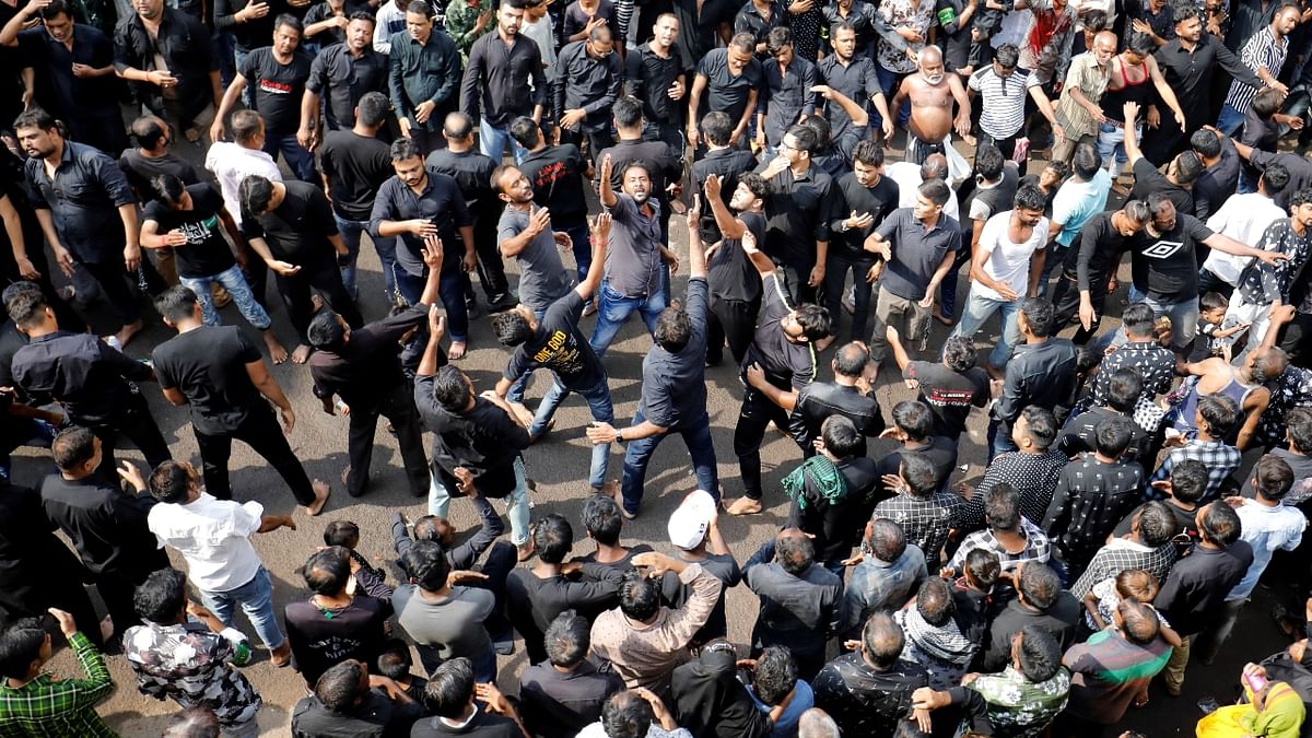 Shiite Muslim mourners beat their chests during a Muharram procession ahead of Ashura in Ahmedabad. Credit: Reuters Photo