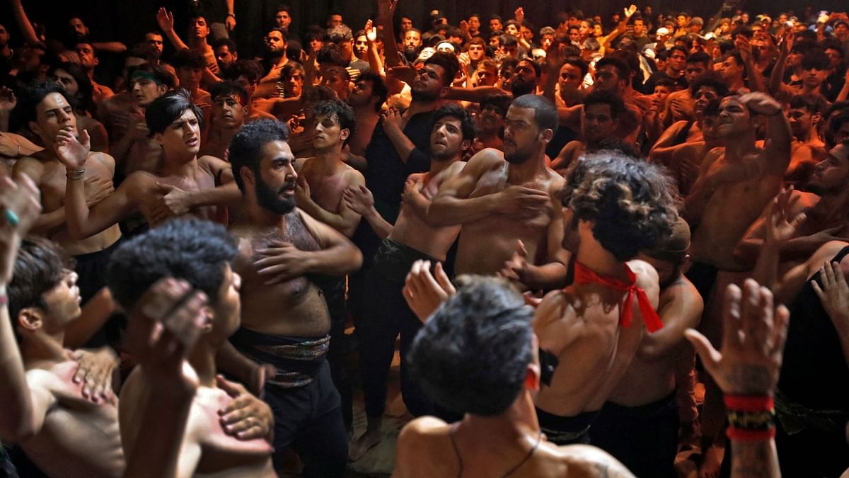 Muslims beat their chests in a religious procession during the month of Muharram leading up to the mourning day of Ashura, in Iraq. Credit: AFP Photo