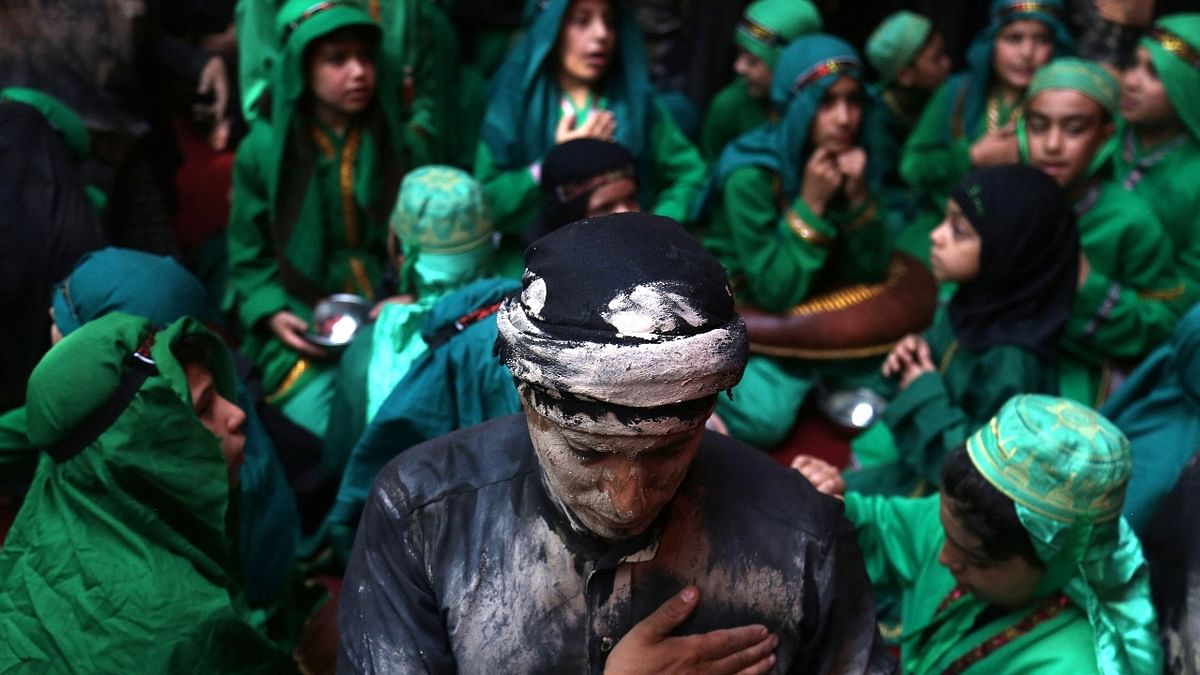 Shiite Muslim worshippers gather inside the holy shrine of Imam Abbas during the Muslim month of Muharram, in Karbala. Credit: AFP Photo