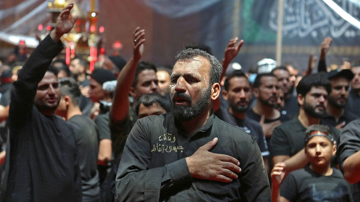Iraqi Shiite Muslims take part in a mourning procession at the Imam Abbas shrine in Iraq's holy city of Karbala. Credit: AFP Photo