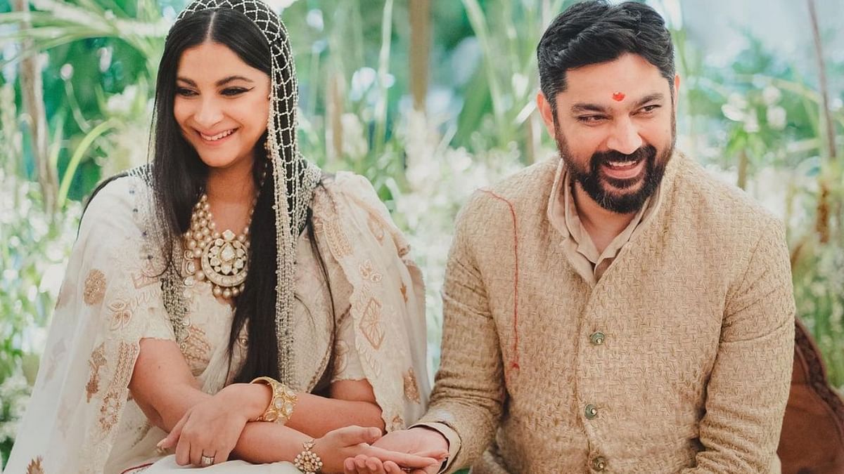 Celebrity and fashion stylist Rhea Kapoor tied the knot with her longtime partner Karan Boolani in an intimate ceremony at her Juhu residence on August 14. Credit: Instagram/rheakapoor