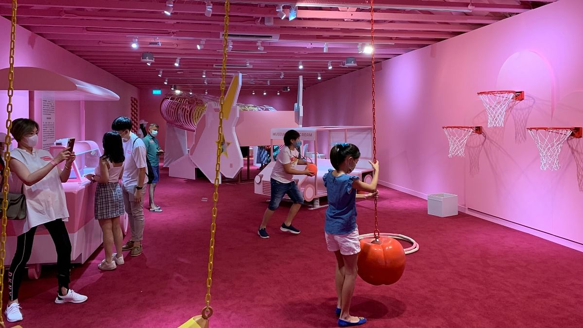 Visitors were required to book in advance to prevent crowding and many were excited about the interactive exhibits - free-flow ice cream and children's ball pool filled with plastic multi-coloured ice cream sprinkles. Credit: Reuters Photo