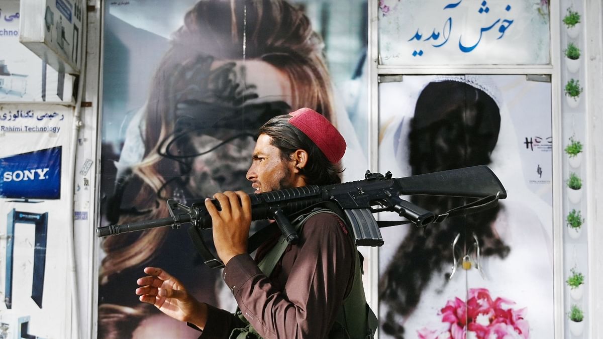 Pictures of women vandalised in Kabul as Taliban tightens its grip on Afghanistan Credit: AFP Photo