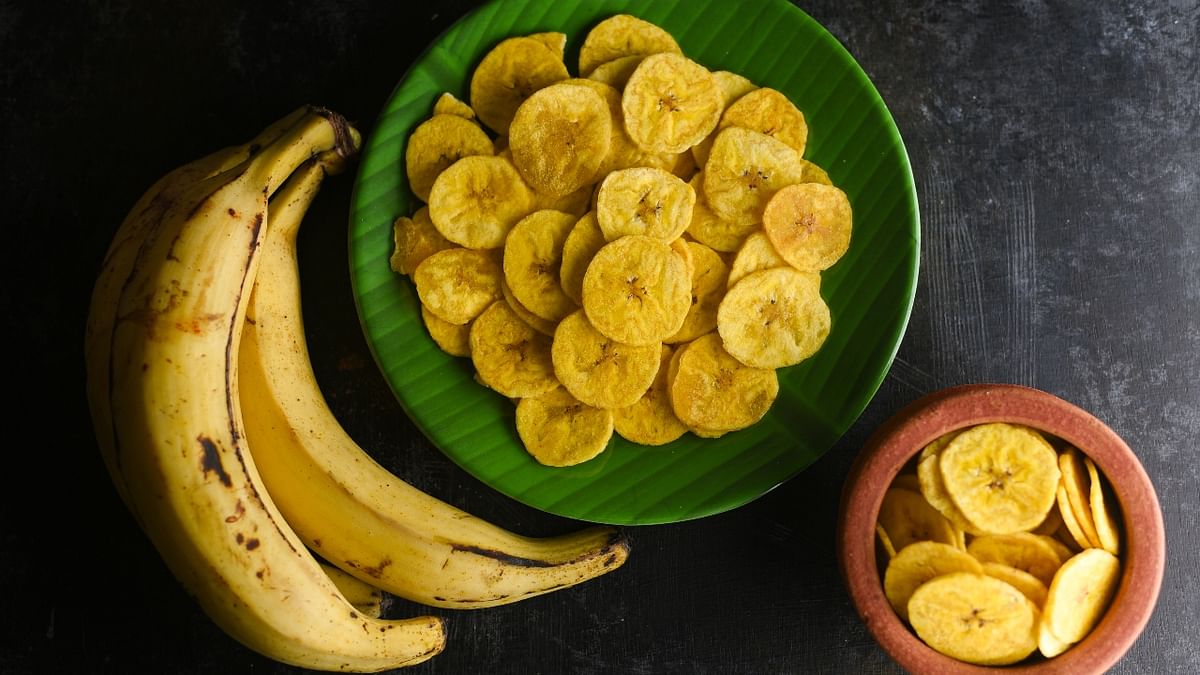 Banana Chips: Banana chips are deep-fried and/or dried slices of bananas. They can either be fried in oil or dried with spices. They have a salty and/or spicy taste. Credit: Getty Images