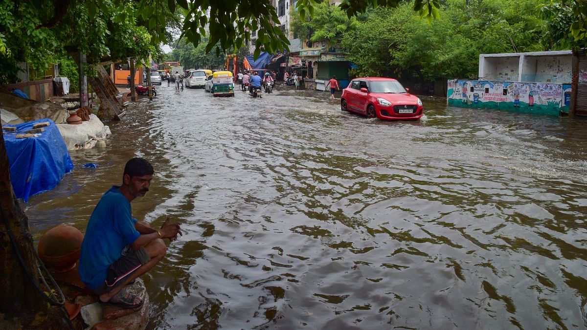 Heavy rain again lashed several parts of Delhi. The city recorded 139 mm rainfall. The India Meteorological Department (IMD)  also issued an 'orange alert' for the national capital. Credit: PTI Photo