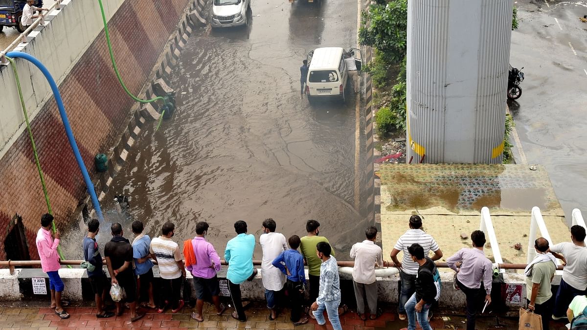 Officials said the incessant rains brought the mercury down and provided relief to Delhiites. Credit: PTI Photo