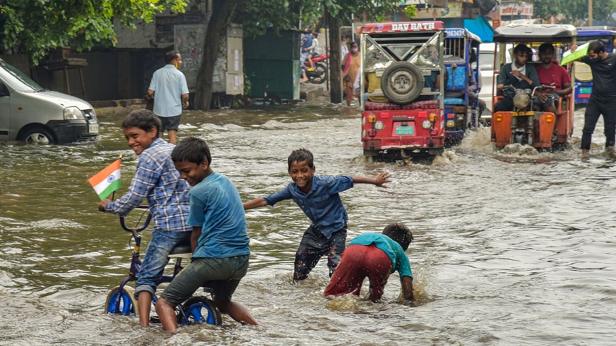 Rains caused waterlogging in many parts of the city, including underneath Minto Bridge, Moolchand underpass and at the ITO. Credit: PTI Photo