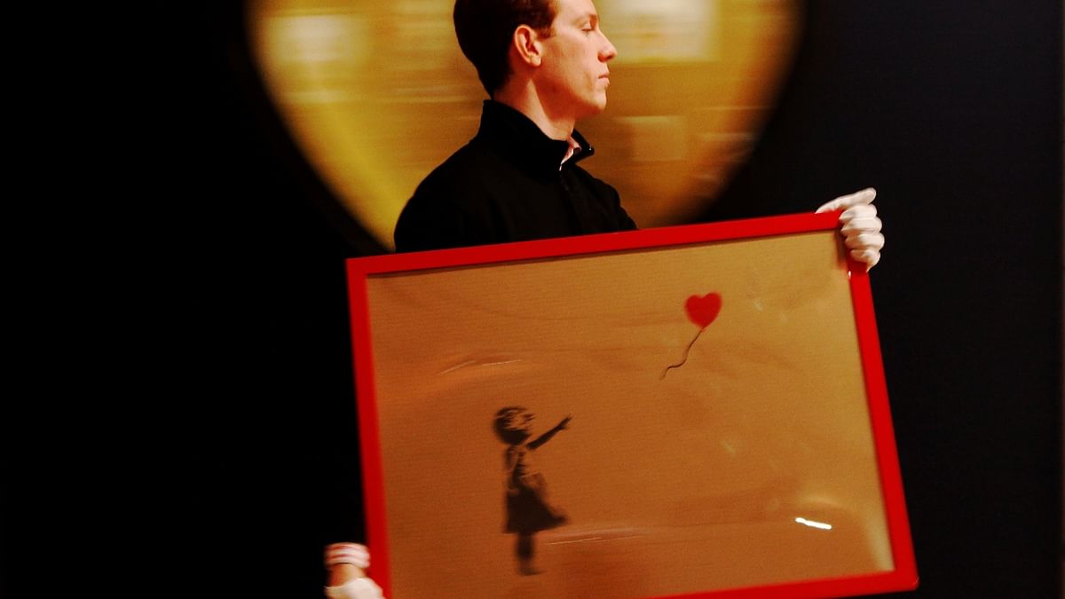 Banksy's 'Girl With Balloon' sold at a Sotheby's auction in London for a staggering price of $1.37 million. Credit: Reuters Photo
