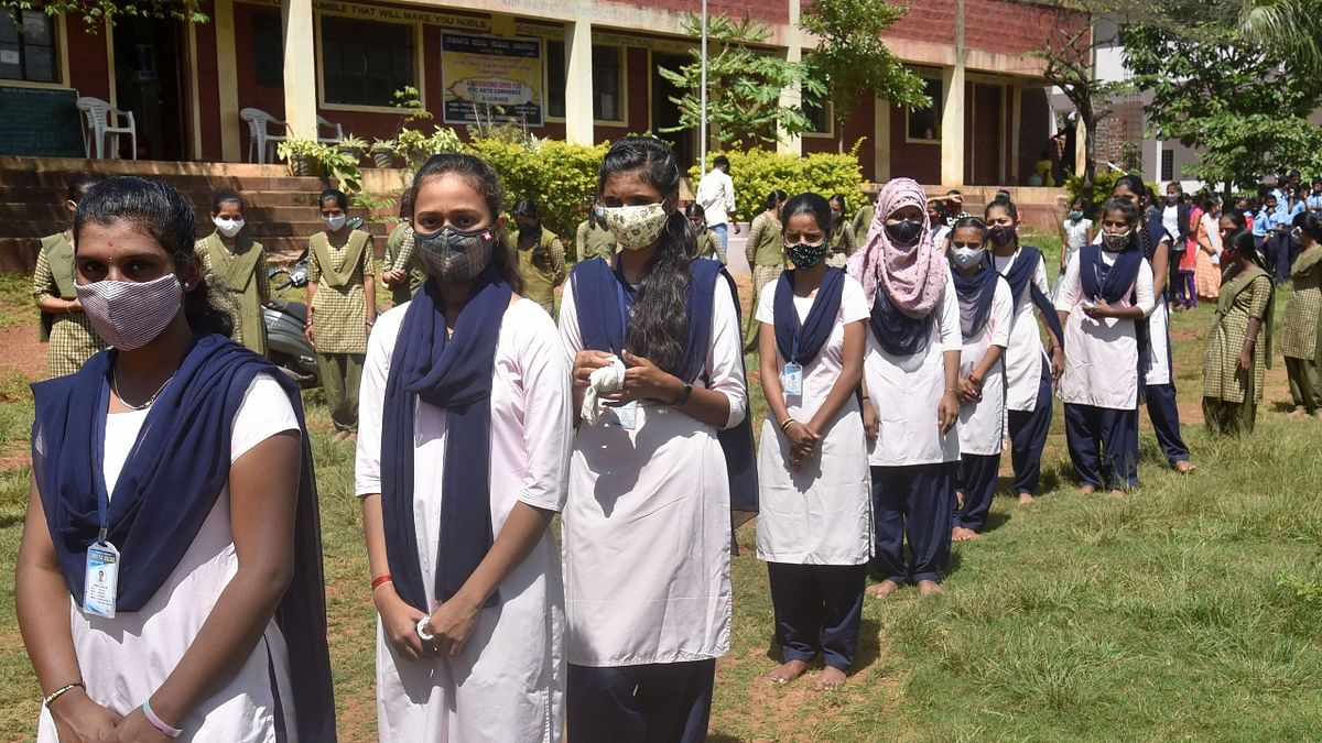 Students back in campuses as Karnataka schools, colleges reopen — See pictures