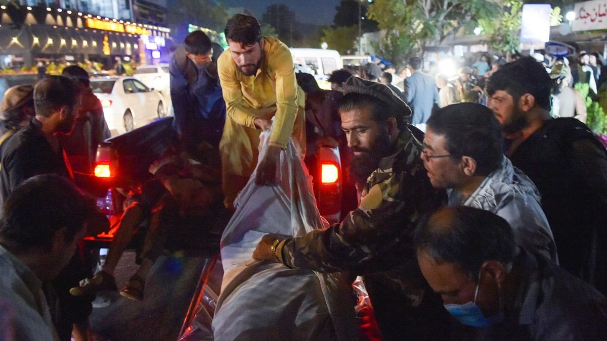 The attack, orchestrated by suicide bombers belonging to Islamic State (IS) left several Afghans, Taliban members and soldiers injured | Credit: AFP Photo