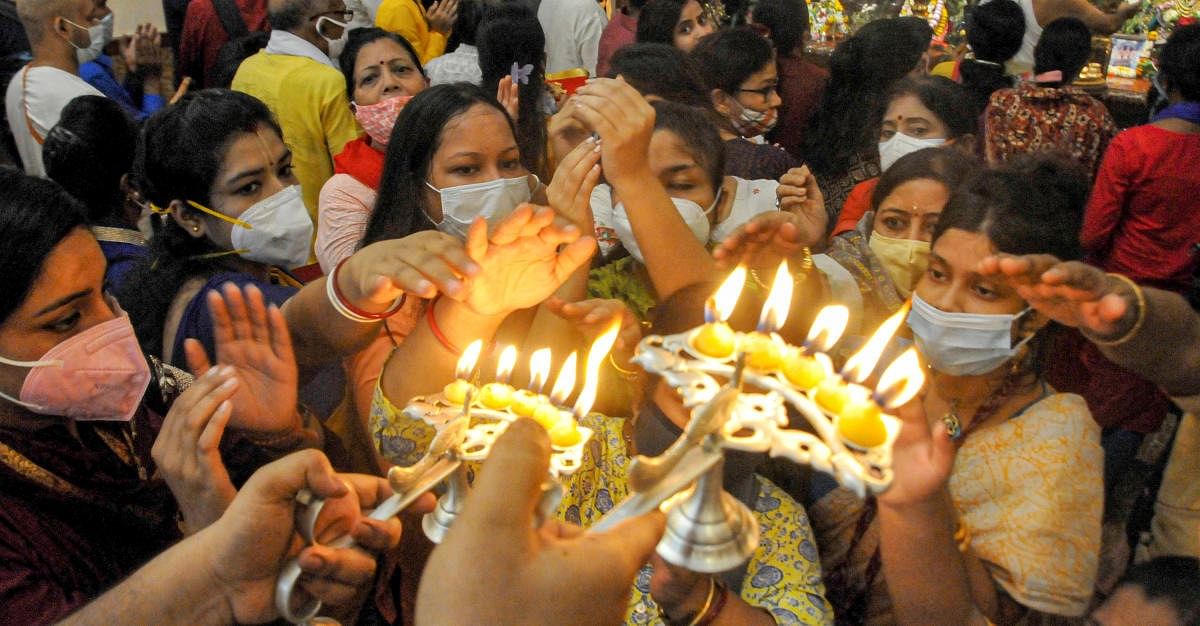 Devotees seek blessings of Lord Krishna on 'Janmashtami' festival at an ISKCON temple in Kolkata. Credit: PTI Photo