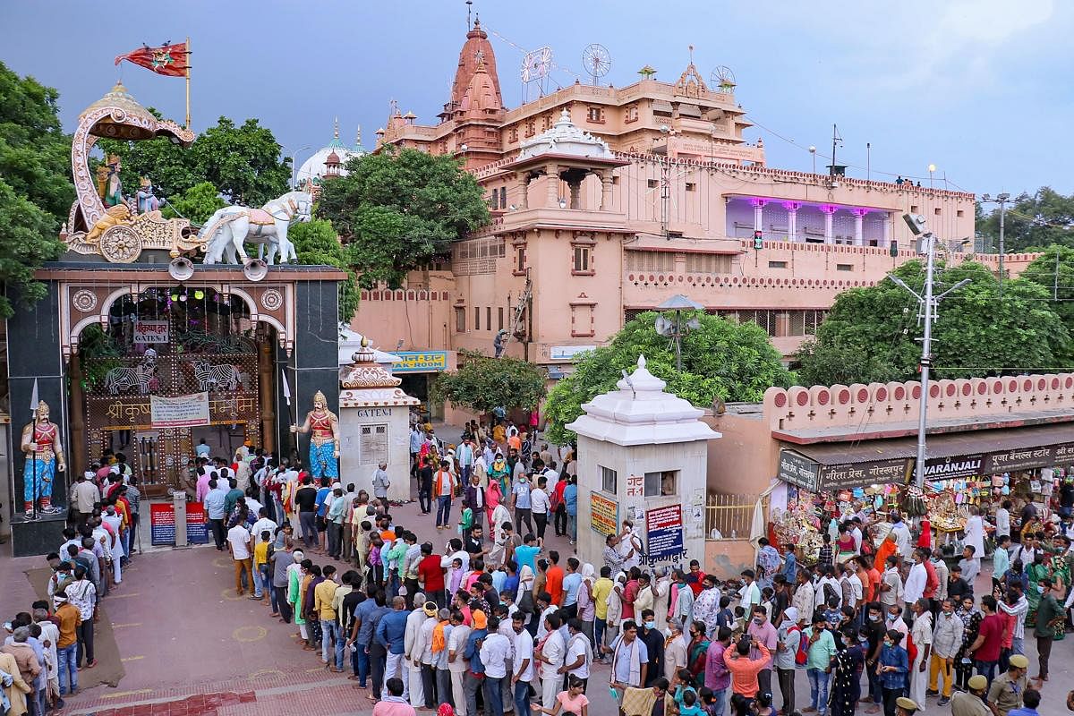 Devotees throng to pay obeisance to Lord Krishna at Sri Krishna Janambhoomi temple ahead of the 'Janmashtami' festival, in Mathura. Credit: PTI Photo