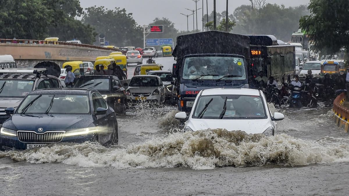 Delhi recorded 112.1 mm rainfall in 24 hours ending at 8:30 am on Wednesday, the highest single-day precipitation in September in 19 years, according to India Meteorological Department (IMD). Vehicles ply on a waterlogged road after heavy rains, near AIIMS Hospital in New Delhi. Credit: PTI Photo