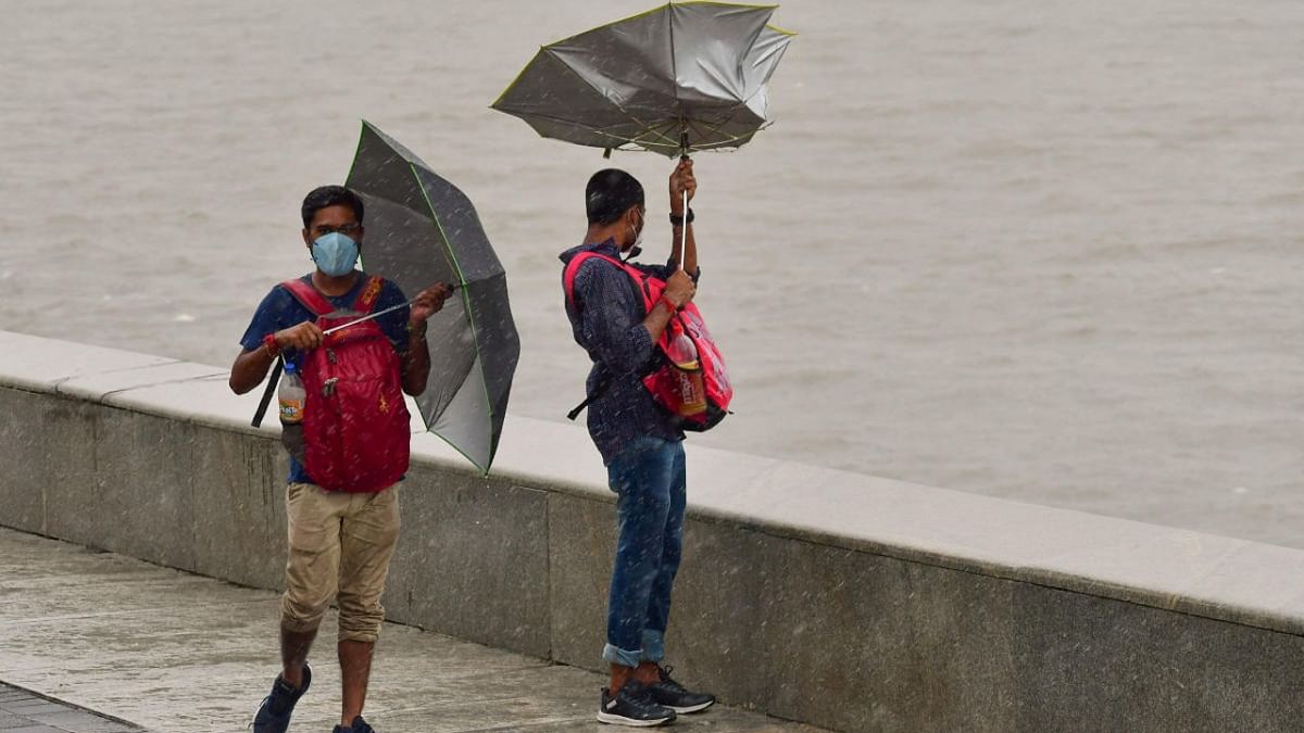 The incessant showers led to a landslide in Mumbai's Asalpha area, injuring some people, officials said. The rains also caused water-logging in Andheri, Parel, Bhandup and some other areas, slowing traffic movement on roads in those places. Credit: PTI Photo