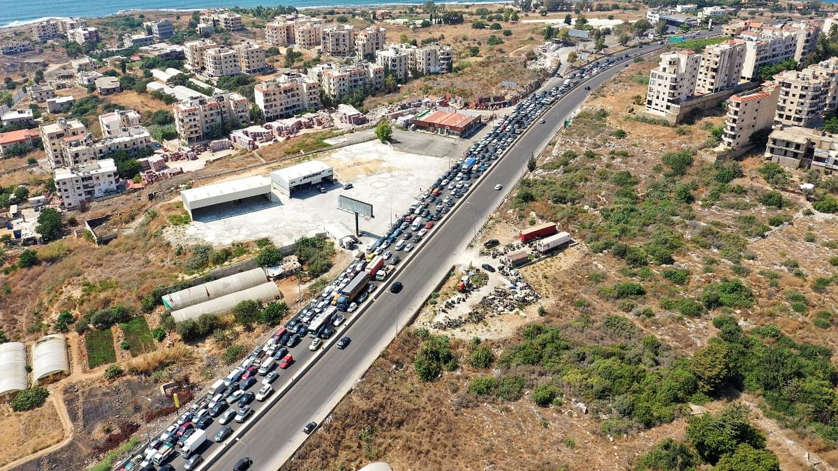 The economic collapse that has caused the Lebanese extreme hardships for two years hit a crunch point this month with fuel shortages paralyzing even essential services and miles-long queues forming at gas stations with little or no petrol to sell. Credit: Reuters Photo