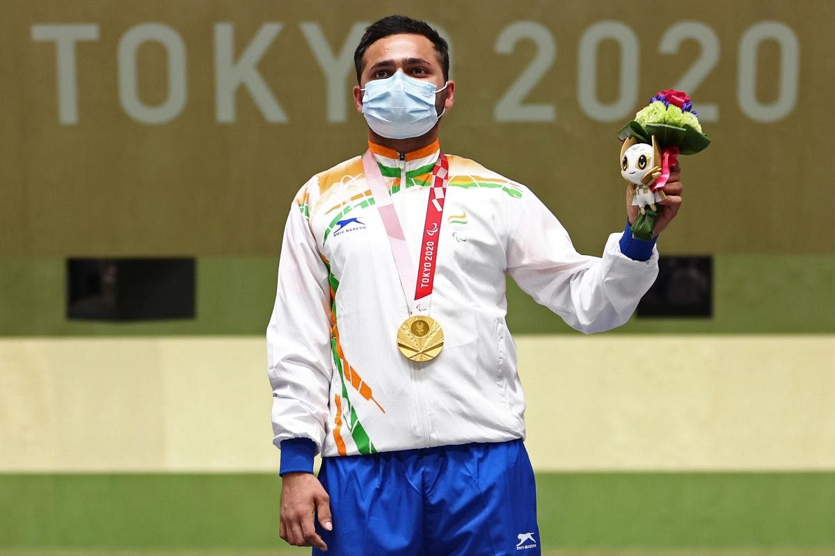 Shooter Manish Narwal smashed the Paralympic record to clinch India's third gold in P4 Mixed 50m Pistol SH1 event at Tokyo Paralympics. Credit: Reuters Photo