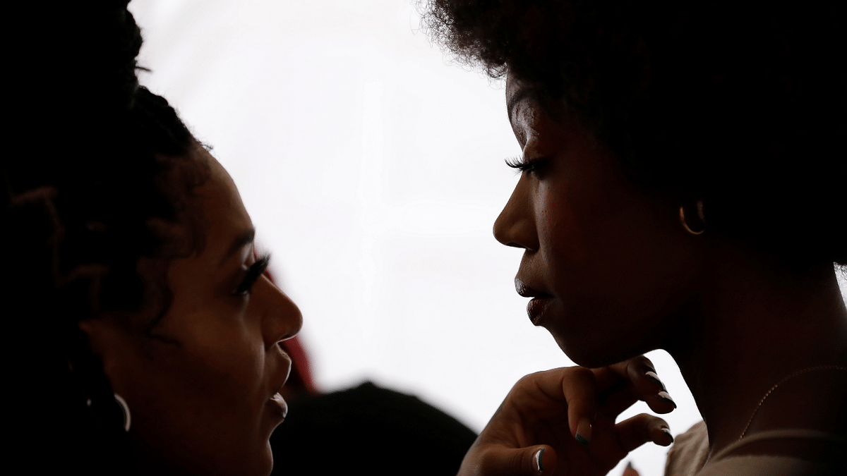 A model is prepared backstage at Harlem Fashion Week in Manhattan, New York City. Credit: Reuters Photo