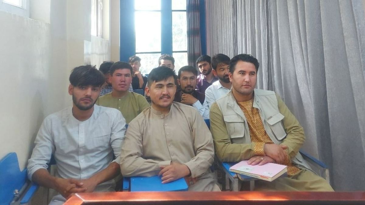 Students attend class under new classroom conditions at Avicenna University in Kabul, Afghanistan. Credit: Reuters Photo