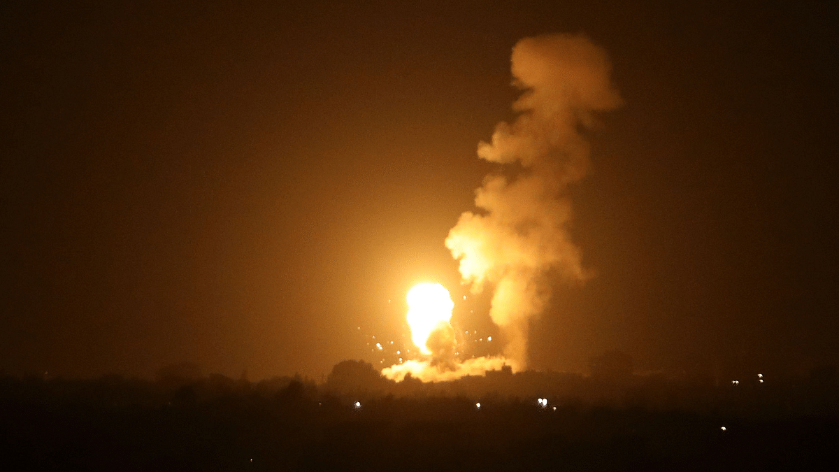 A fireball rises following an air strike in Khan Yunis in the southern Gaza Strip. Credit: AFP Photo