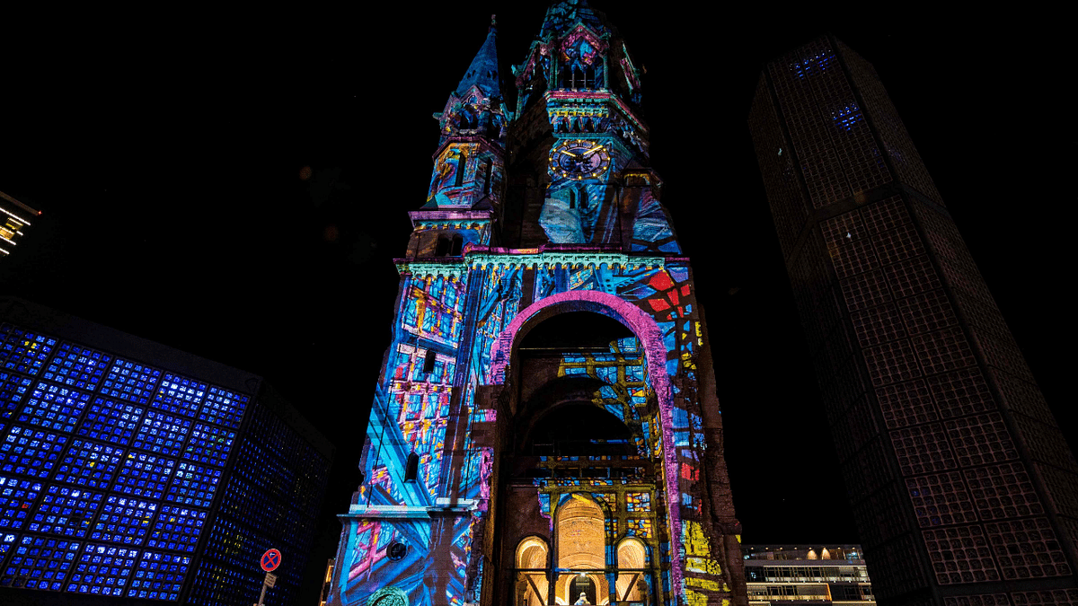 Light designs are projected onto the Kaiser Wilhelm Memorial Church (Gedaechtniskirche) as part of the yearly Festival of Lights in Berlin. Credit: AFP Photo